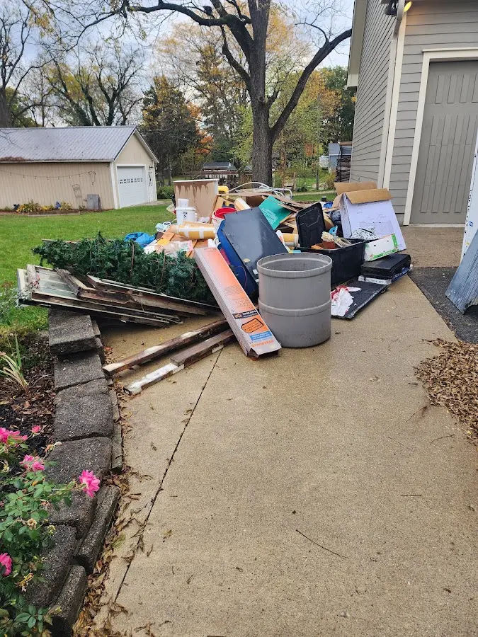 Dumpster being loaded with debris for 3 Yard Dumpster Rental in East Whiteland